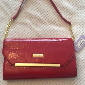 Beautiful bright red marc fisher clutch